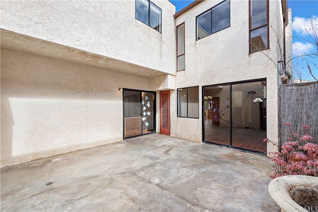 a view of an empty room with closet