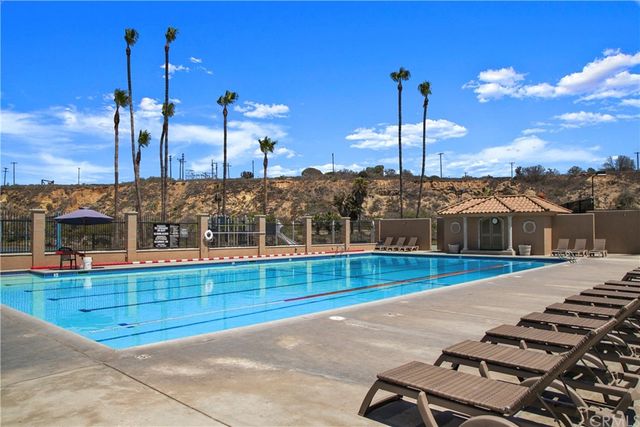 a view of a park with swings