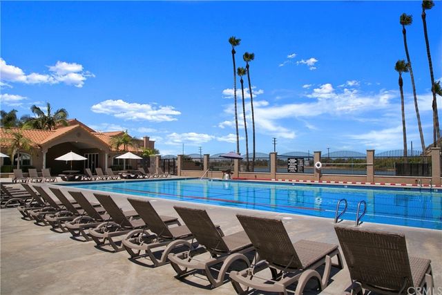 an aerial view of a house with a ocean view