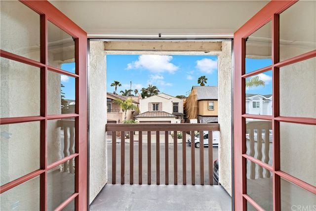 a view of a porch with wooden floor
