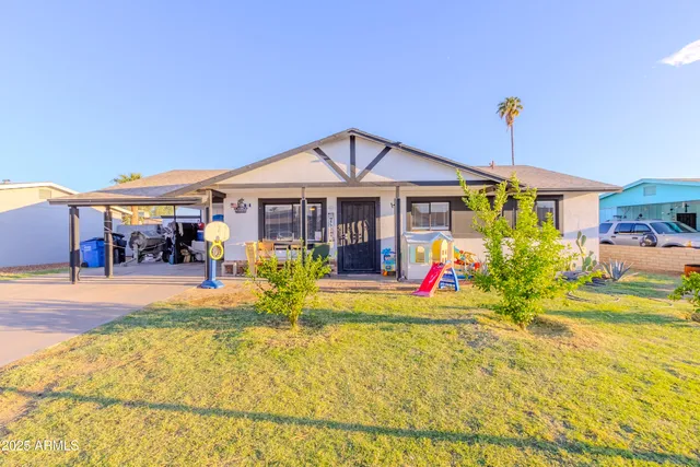 a view of a house with swimming pool
