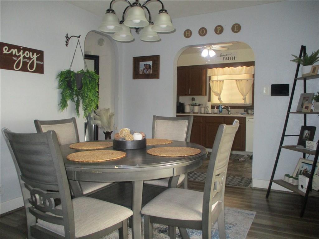 127 Cherry Way Donora, PA 15033 - Photo 14 of 33 a view of a dining room with furniture and wooden floor