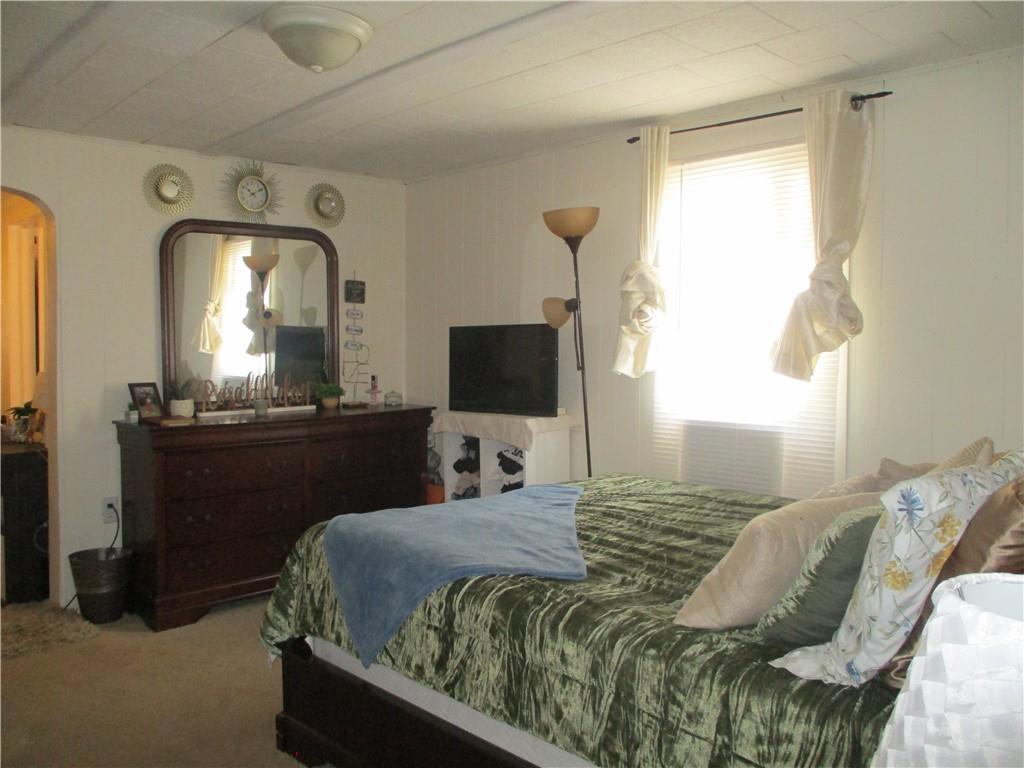 127 Cherry Way Donora, PA 15033 - Photo 20 of 33 a bedroom with a bed and a flat screen tv