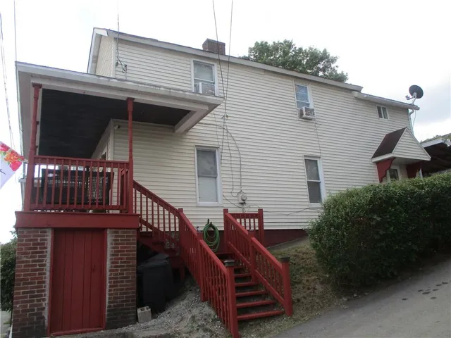 a view of a house with a deck