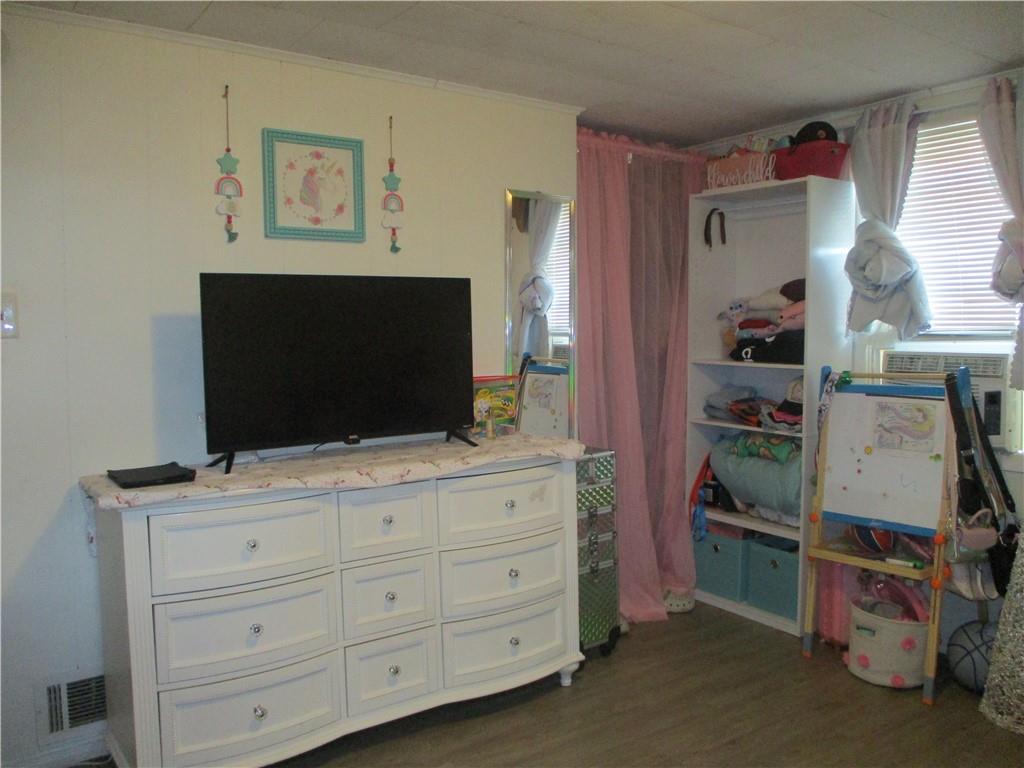 127 Cherry Way Donora, PA 15033 - Photo 26 of 33 a living room with furniture and a flat screen tv