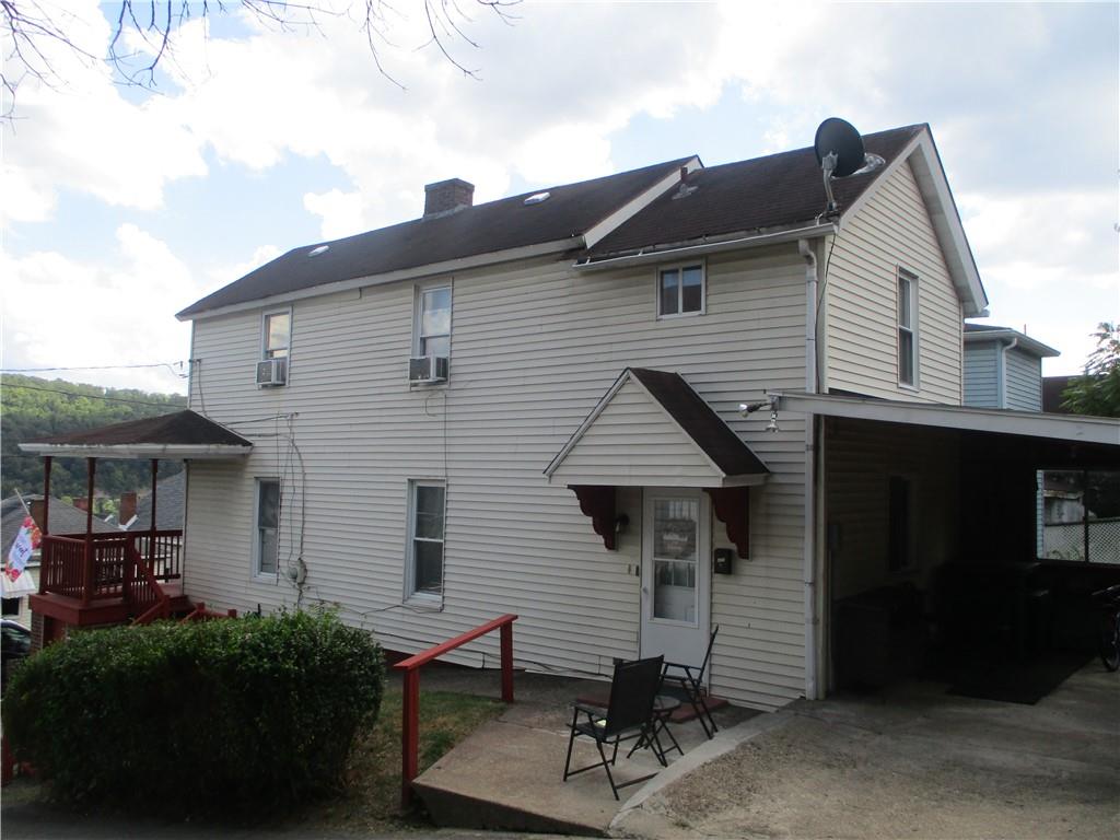 127 Cherry Way Donora, PA 15033 - Photo 5 of 33 a front view of a house with a yard