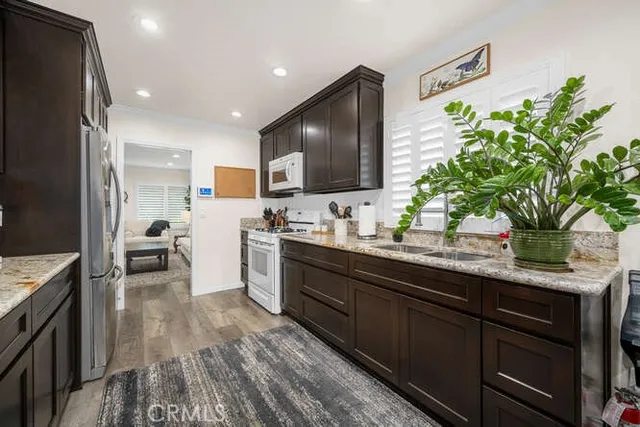a kitchen with granite countertop lots of counter top space