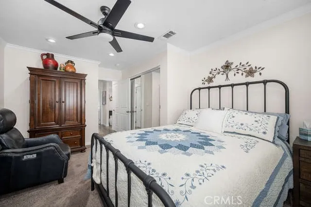 a bed room with a bed and a couch