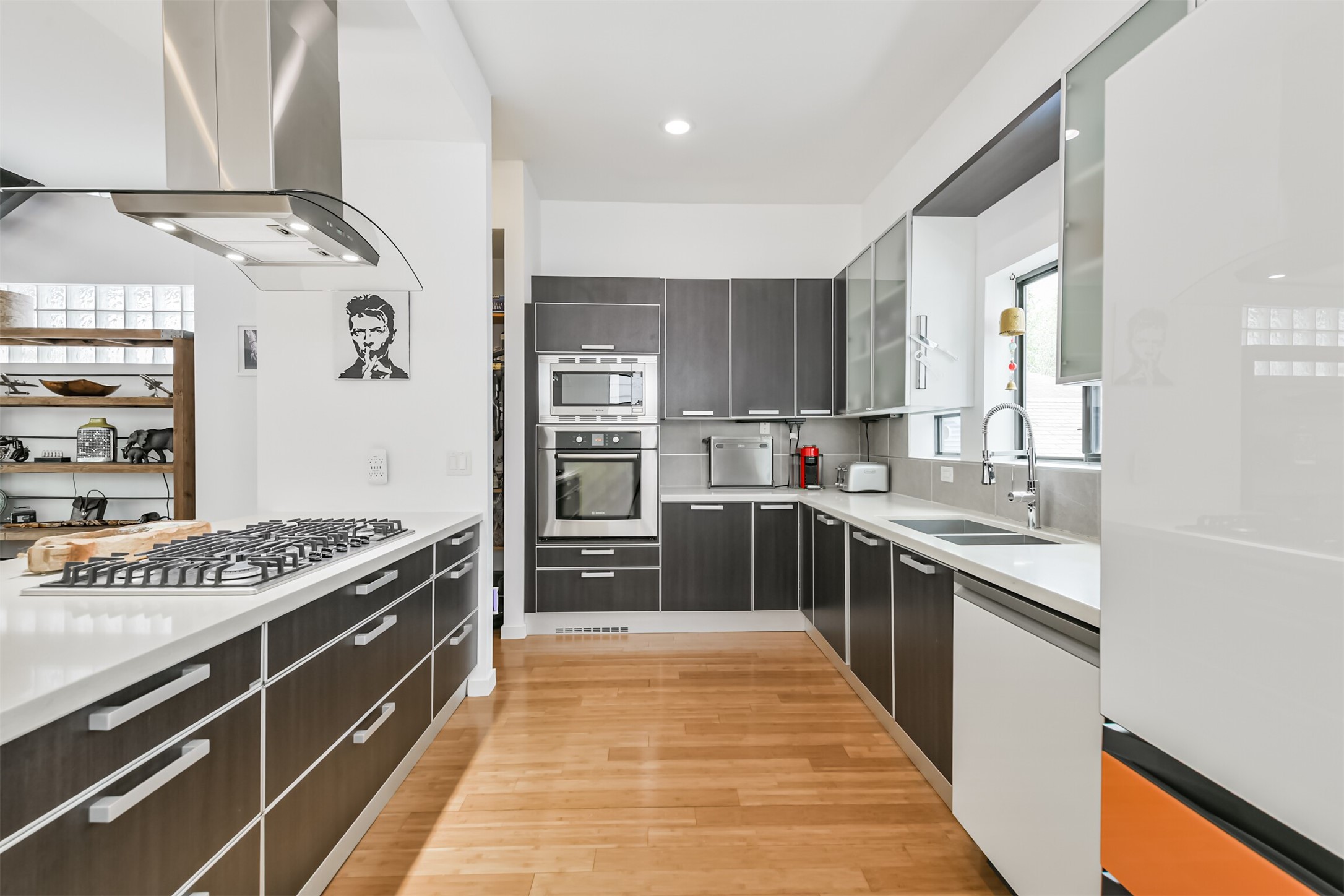 406 Pacific Street Houston, TX 77006 - Photo 17 of 34 Lots of drawers and cabinets in this sleek contemorary kitchen