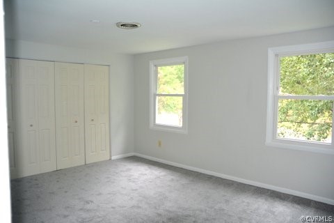517 Wolfberry Road North Chesterfield, VA 23236 - Photo 9 of 15 a view of an empty room with a window