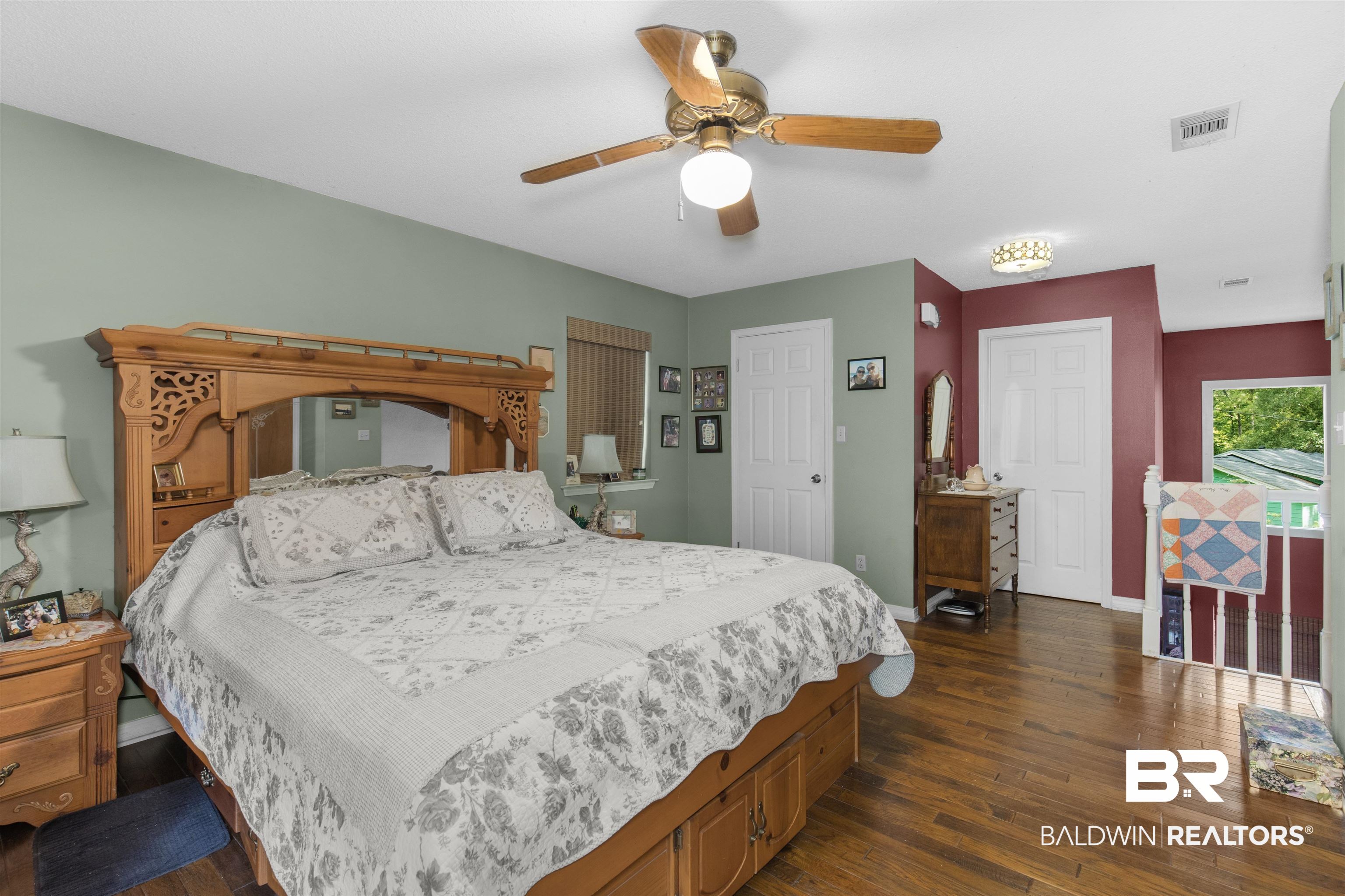 31375 Stagecoach Road Daphne, AL 36527 - Photo 14 of 21 Bedroom featuring dark wood finished floors, baseboards, and a ceiling fan