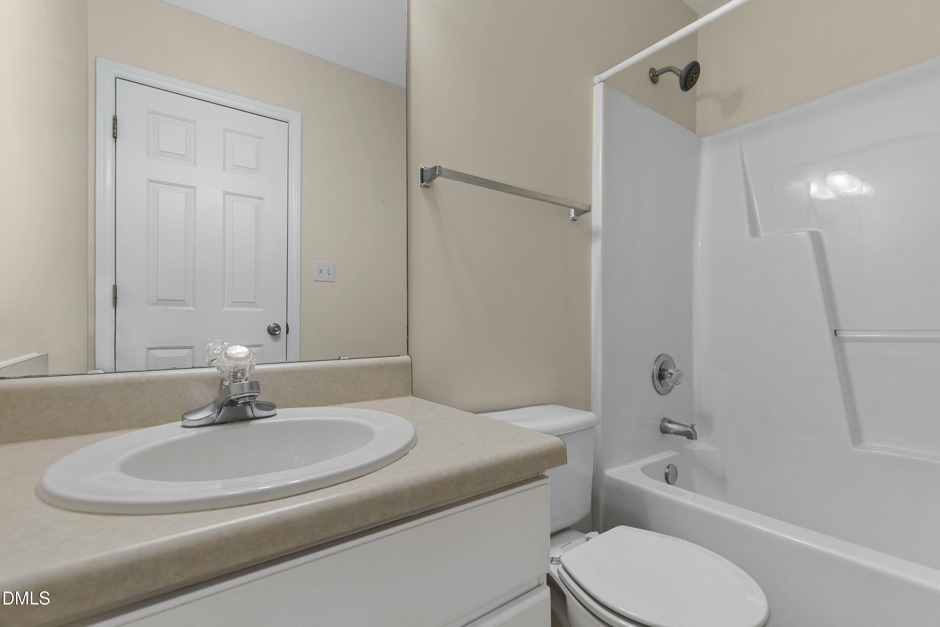 6013 San Marcos Way Raleigh, NC 27616 - Photo 21 of 21 a bathroom with a sink toilet and a bathtub