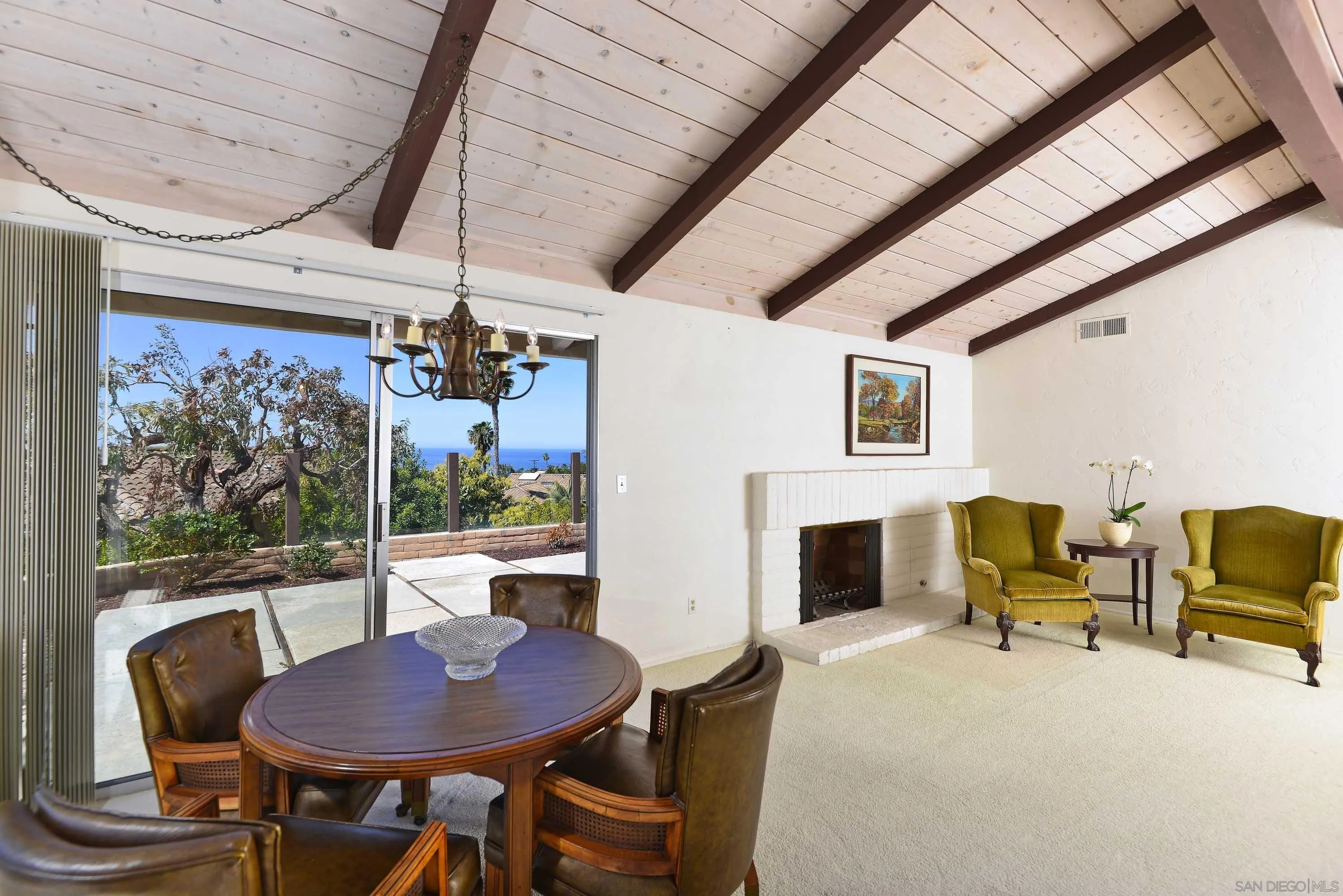 5571 Candlelight Drive La Jolla, CA 92037 - Photo 6 of 25 a view of a livingroom with furniture window and outside view