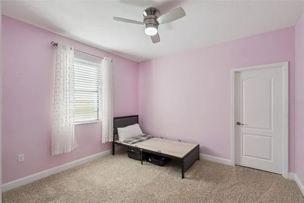 a bathroom with a granite countertop bathtub shower sink and mirror