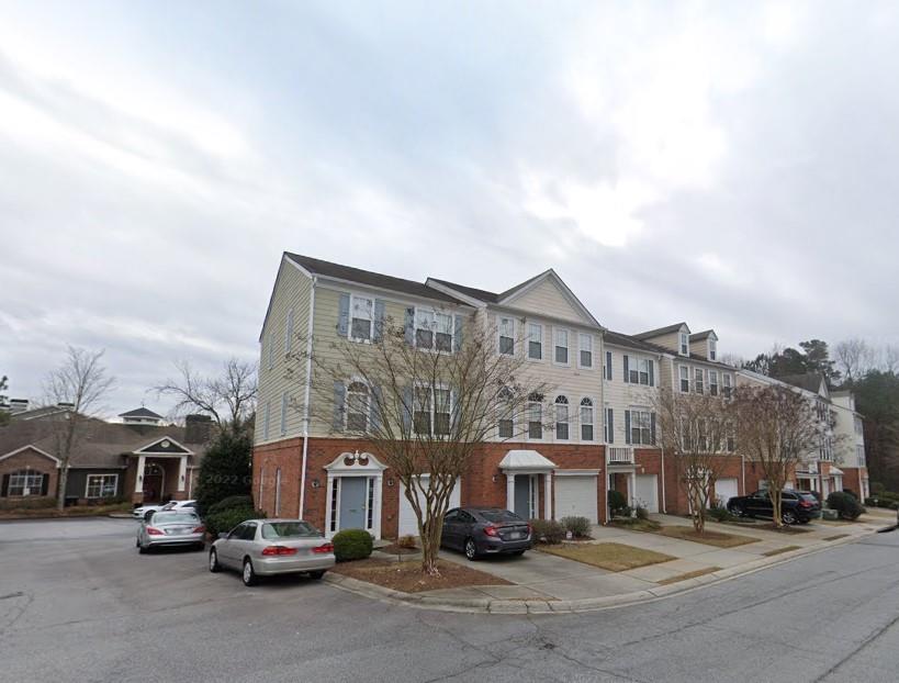 3908 Howell Park Road Duluth, GA 30096 - Photo 1 of 1 a view of multiple houses with a street