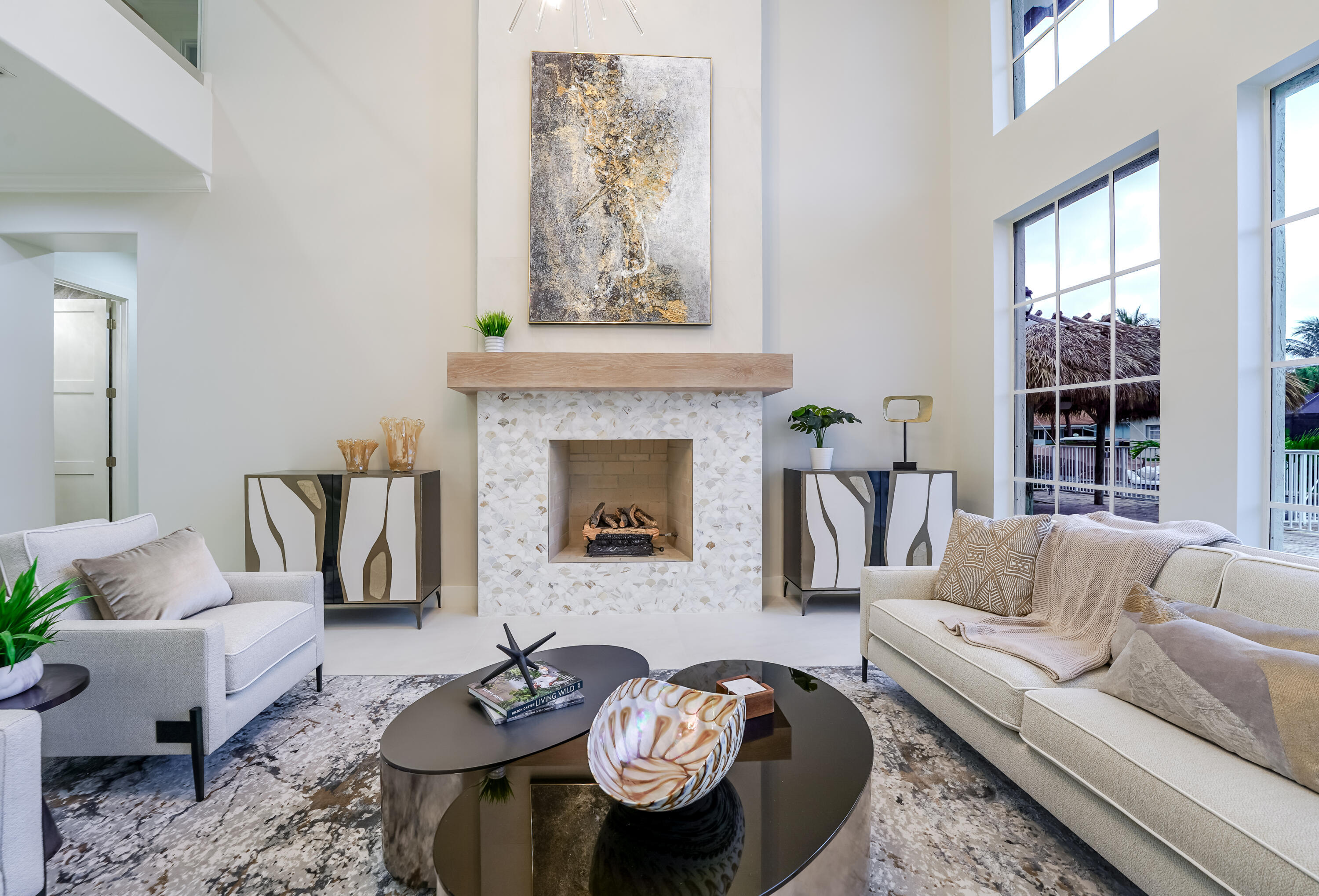 749 Northeast 71st Street Boca Raton, FL 33487 - Photo 6 of 43 a living room with furniture a fireplace and window