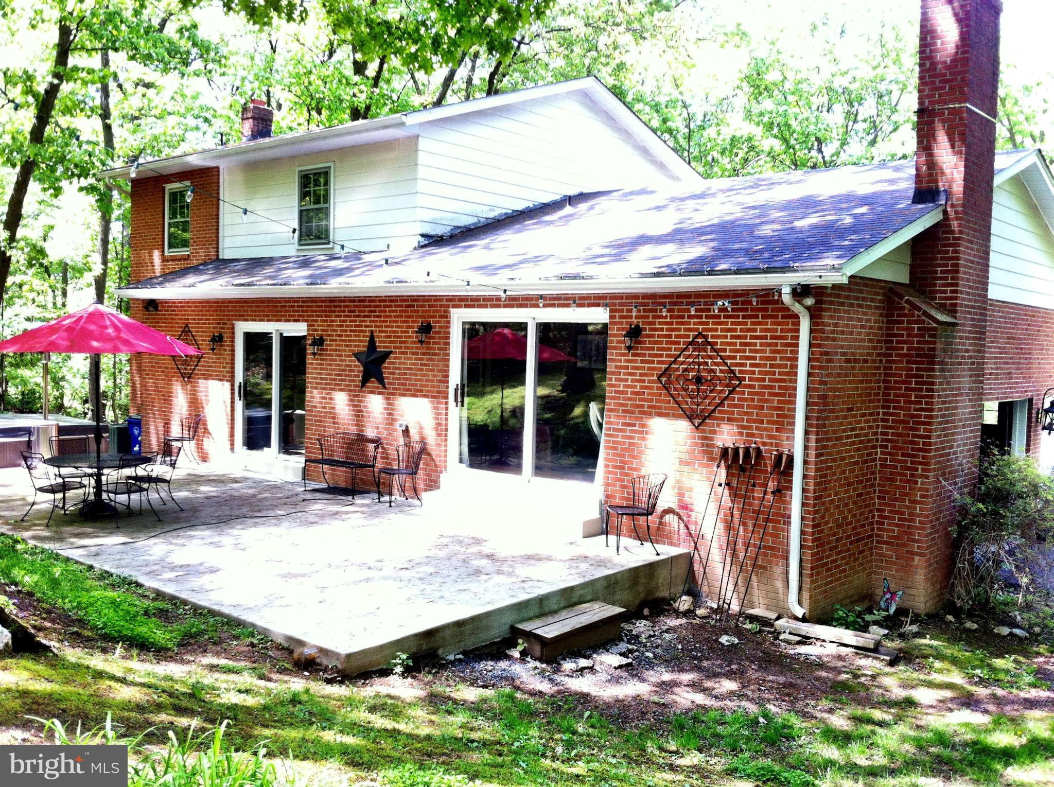 5503 Hines Road Frederick, MD 21704 - Photo 7 of 22 PRIVATE backyard with patio and hot tub