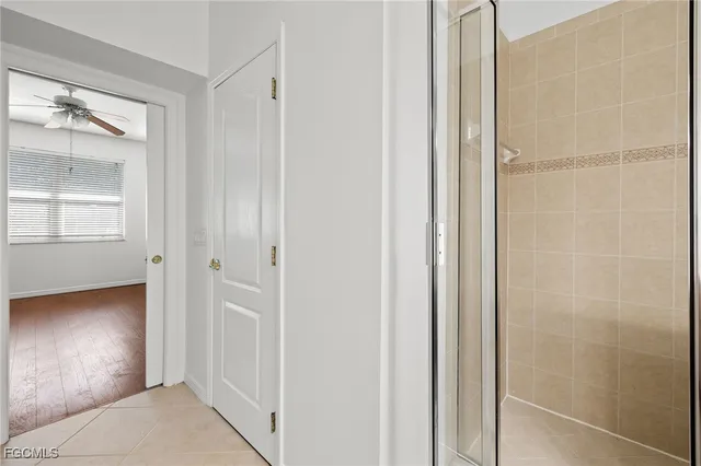 a view of an empty room and closet area