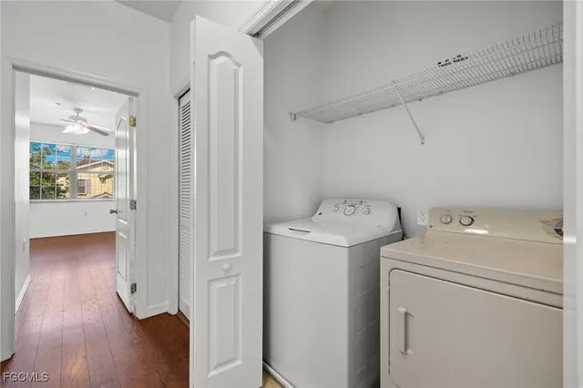 a view of storage and utility room with a washer and dryer