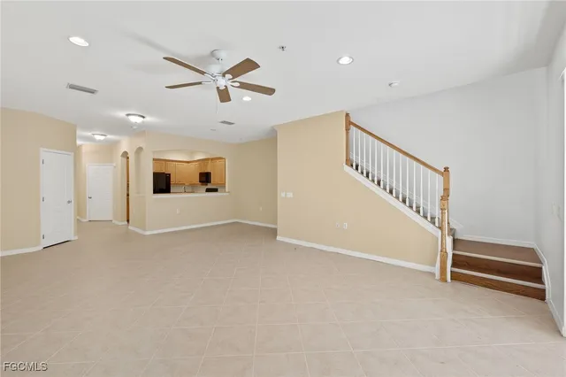 a view of a livingroom with a ceiling fan
