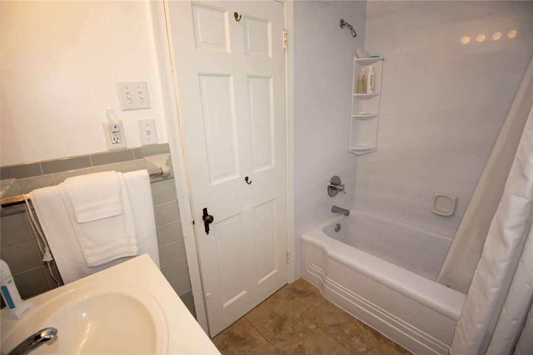 706 Stones Crossing Road Easton, PA 18045 - Photo 20 of 40 Functional full bathroom with a shower-tub combo and a classic vanity.