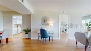 a view of a room with a table and chair