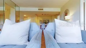 a view of a living room and dining room