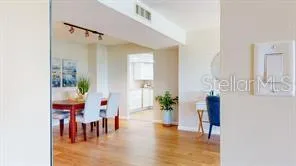 a kitchen with a stove and a refrigerator