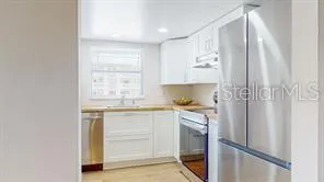 a living room with furniture and window