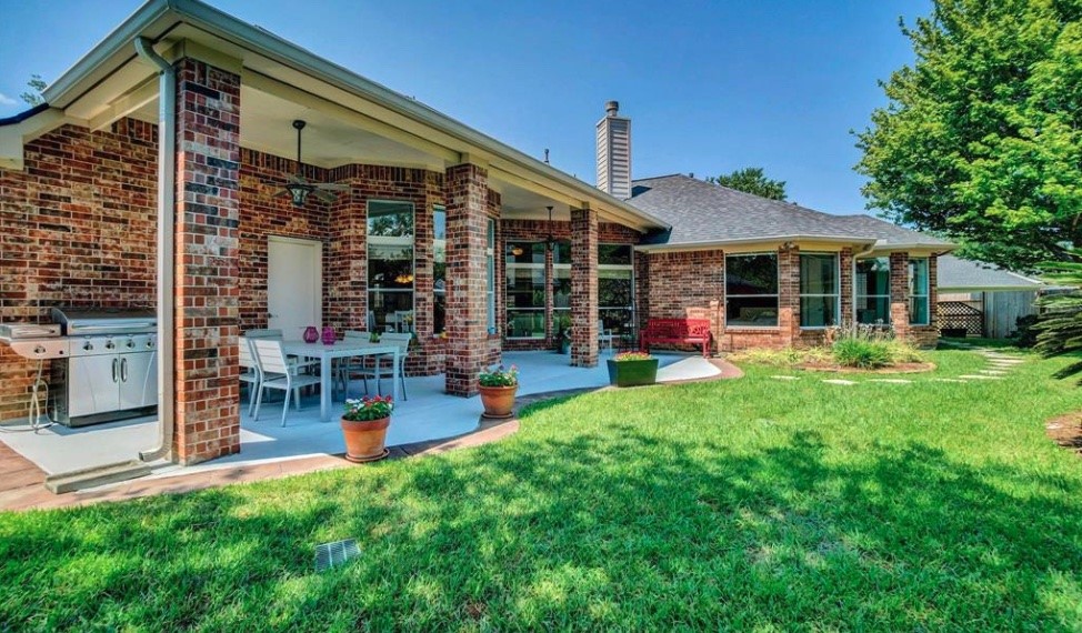 12210 Pebble Meadows Houston, TX 77041 - Photo 20 of 28 An extra-large covered patio ideal for outdoor entertaining