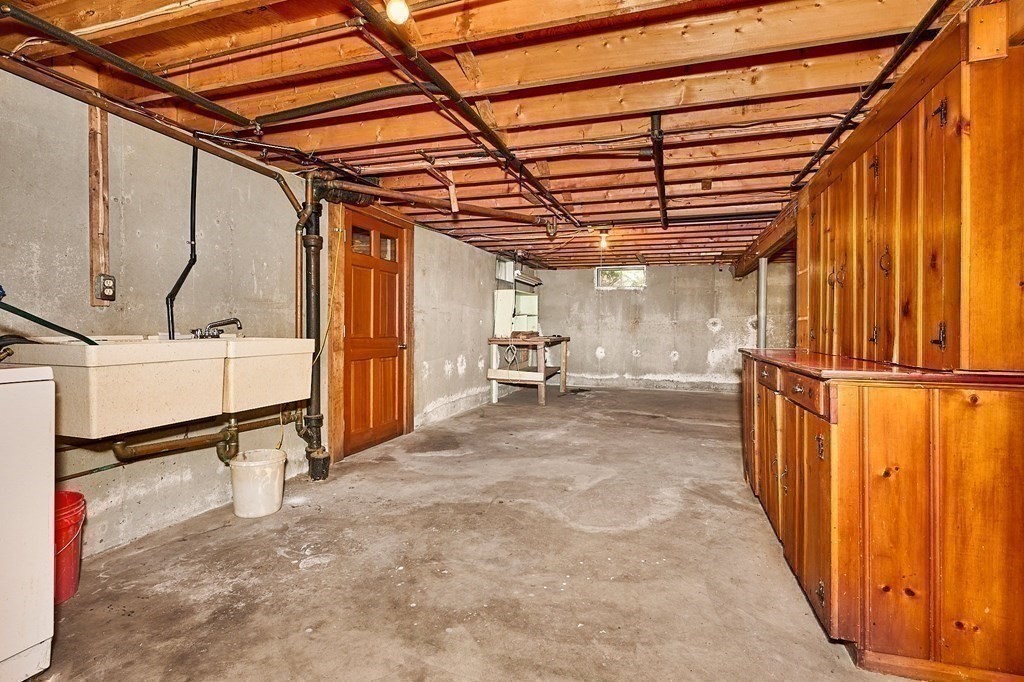 56 Thaddeus Street Chicopee, MA 01020 - Photo 16 of 24 a view of an empty room with a window