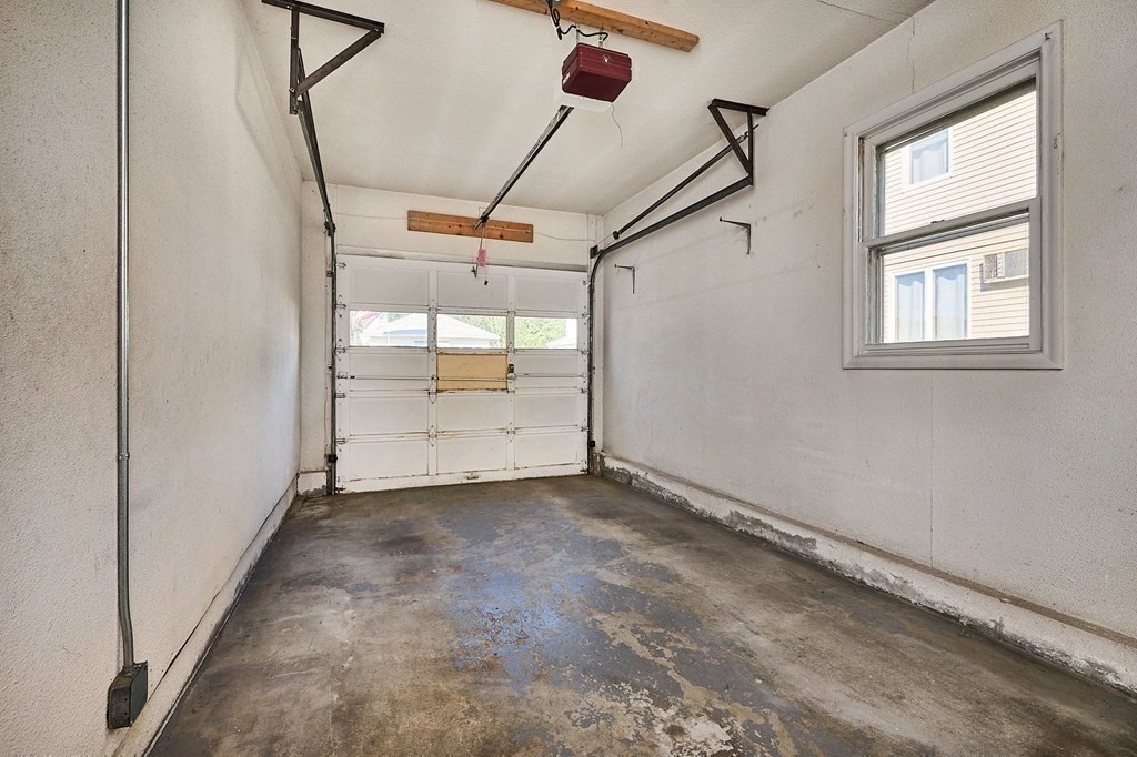 56 Thaddeus Street Chicopee, MA 01020 - Photo 18 of 24 an empty room with windows