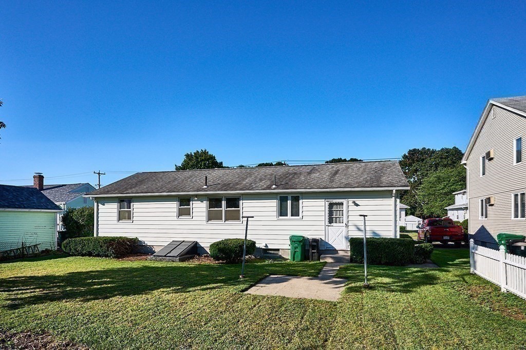 56 Thaddeus Street Chicopee, MA 01020 - Photo 19 of 24 a front view of a house with a yard