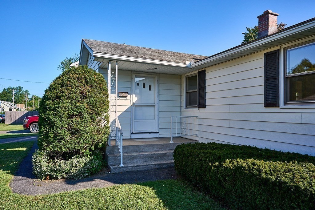 56 Thaddeus Street Chicopee, MA 01020 - Photo 24 of 24 a view of a house with a garden
