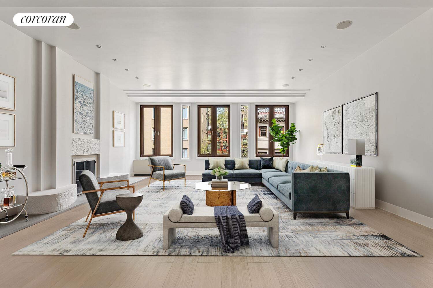 a living room with fireplace furniture and a large window