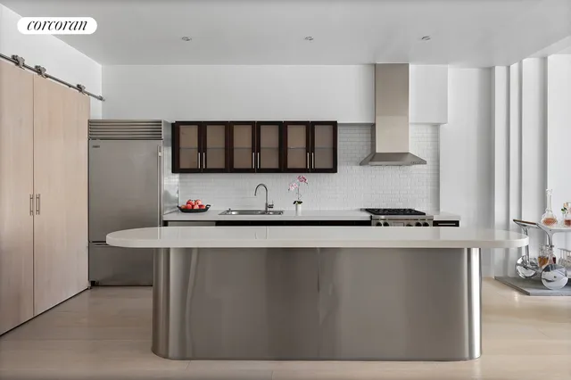 a living room with furniture a dining table and chairs
