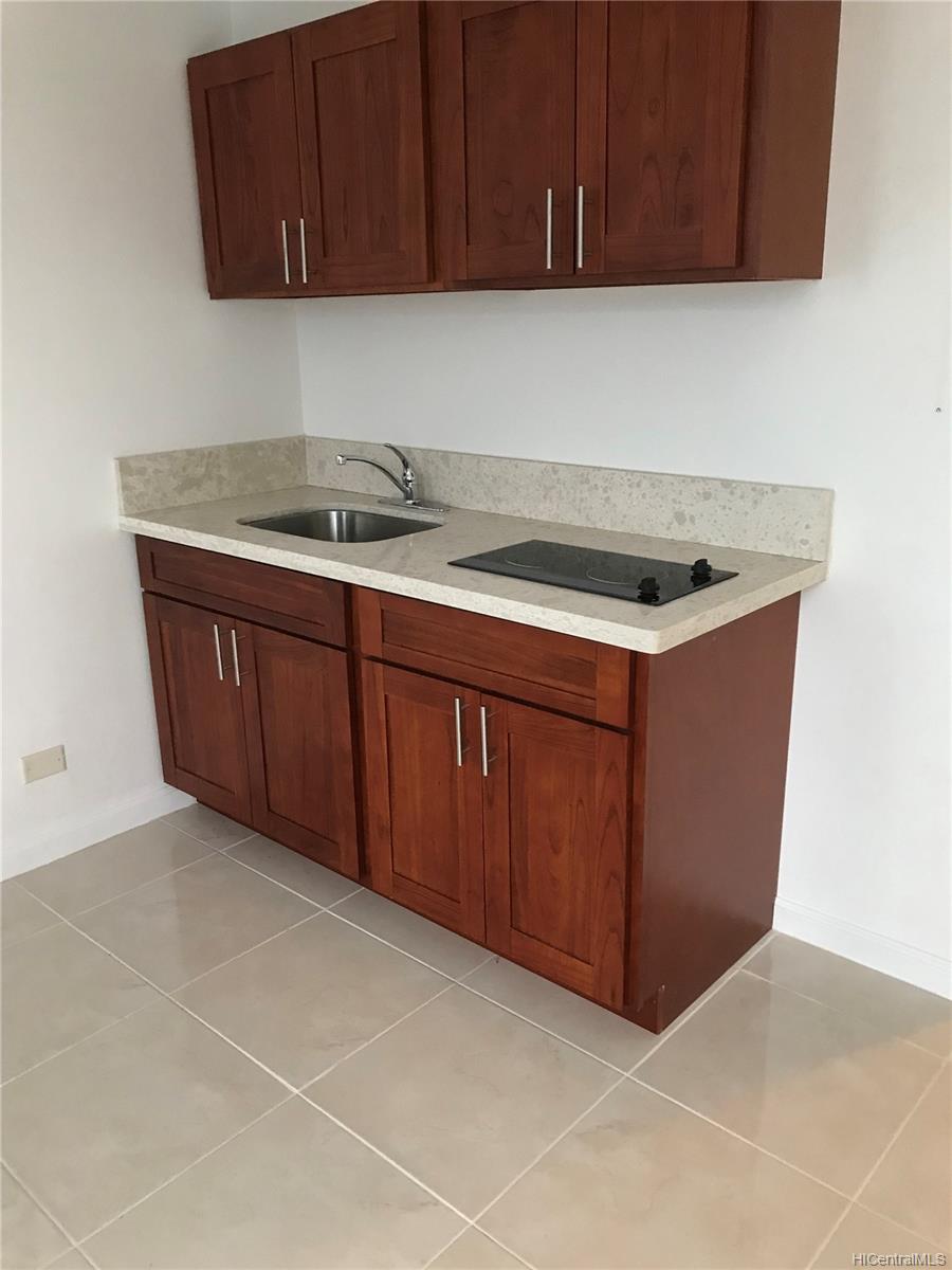 a kitchen with a cabinets