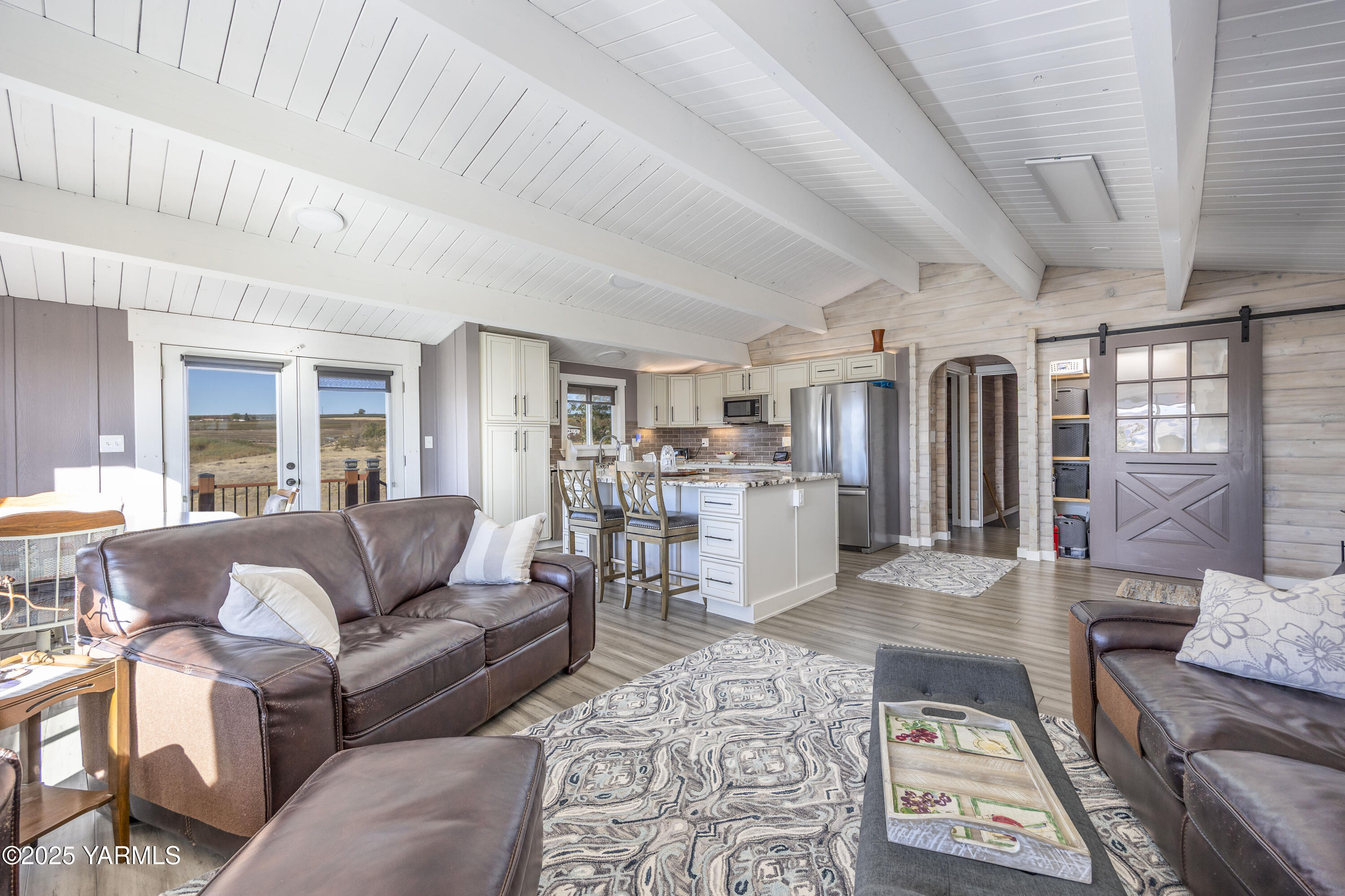 22207 West Gerrick Road Benton City, WA 99320 - Photo 23 of 60 a living room with furniture and wooden floor