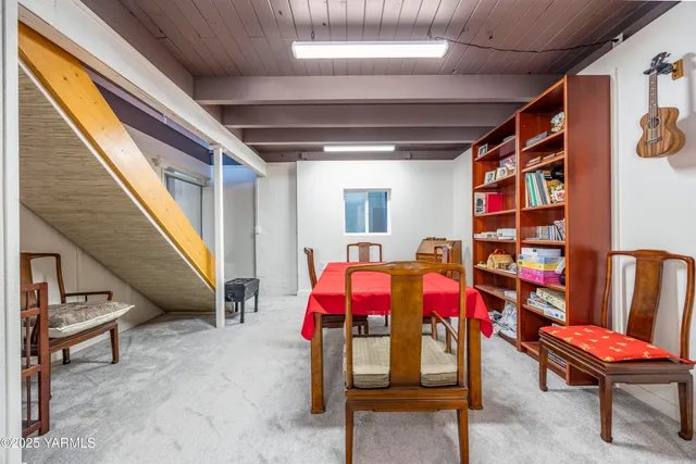 a bedroom with a large bed and a closet