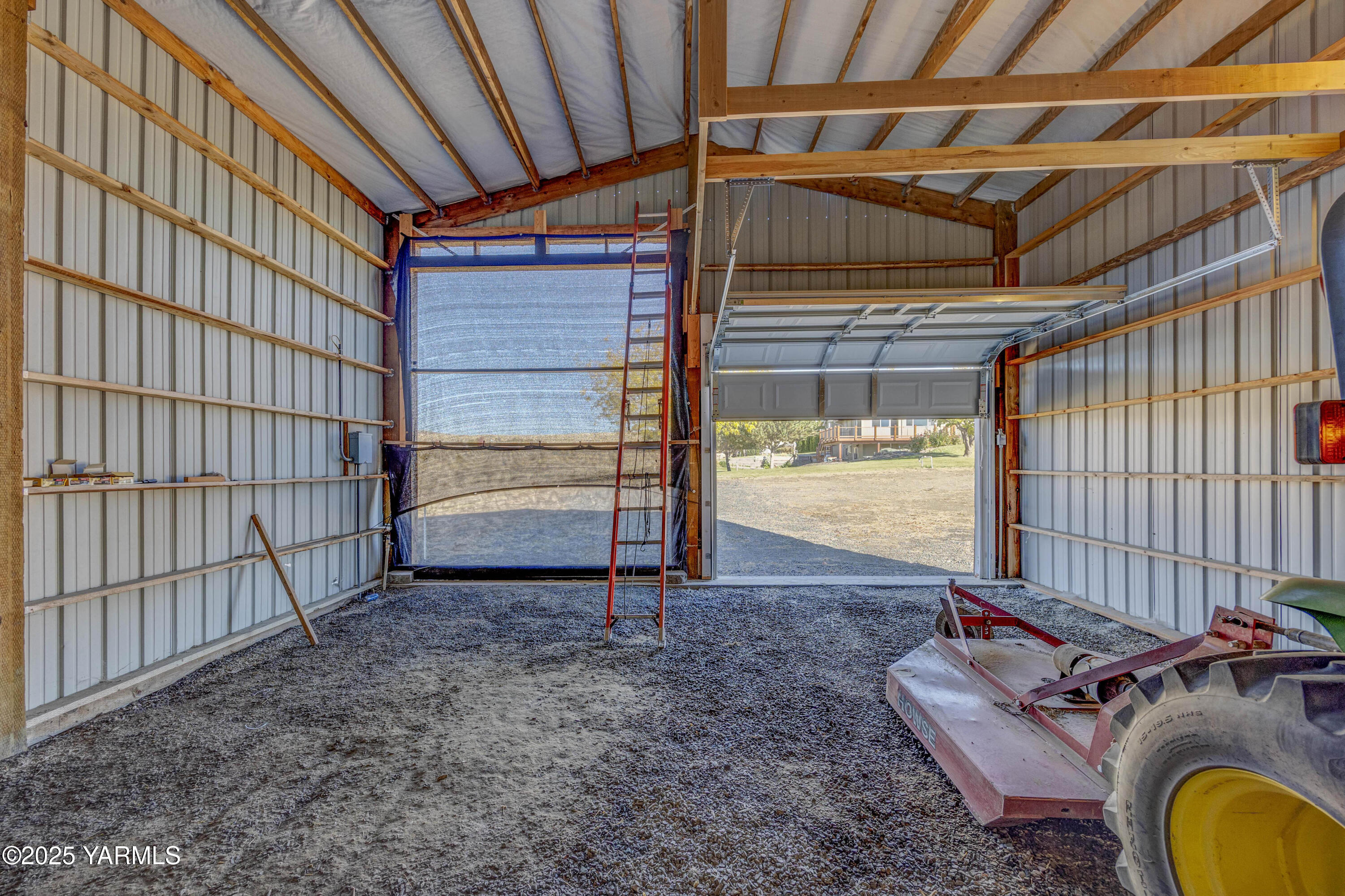 22207 West Gerrick Road Benton City, WA 99320 - Photo 42 of 60 a view of a room with wooden walls