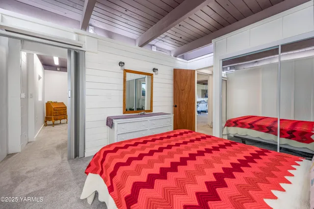 a view of a big house with a yard