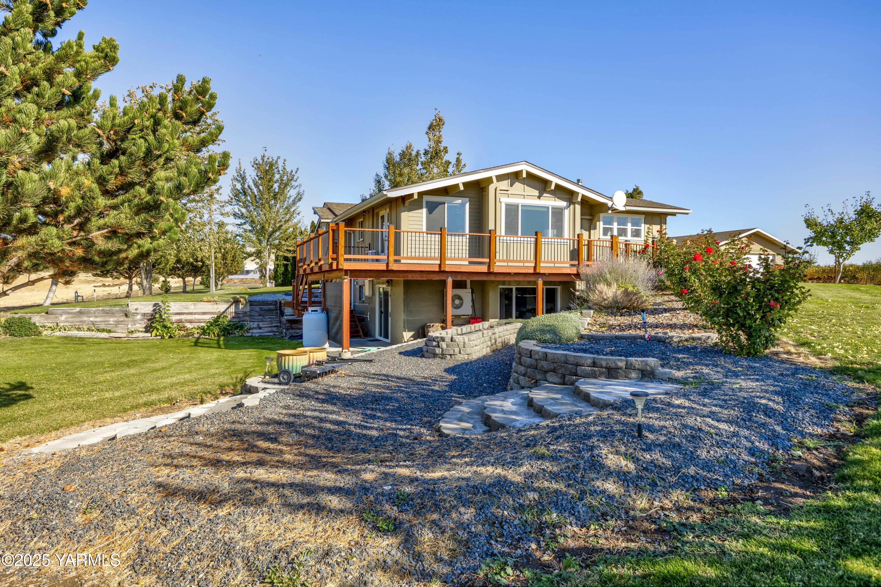 22207 West Gerrick Road Benton City, WA 99320 - Photo 49 of 60 a view of a big house with a yard