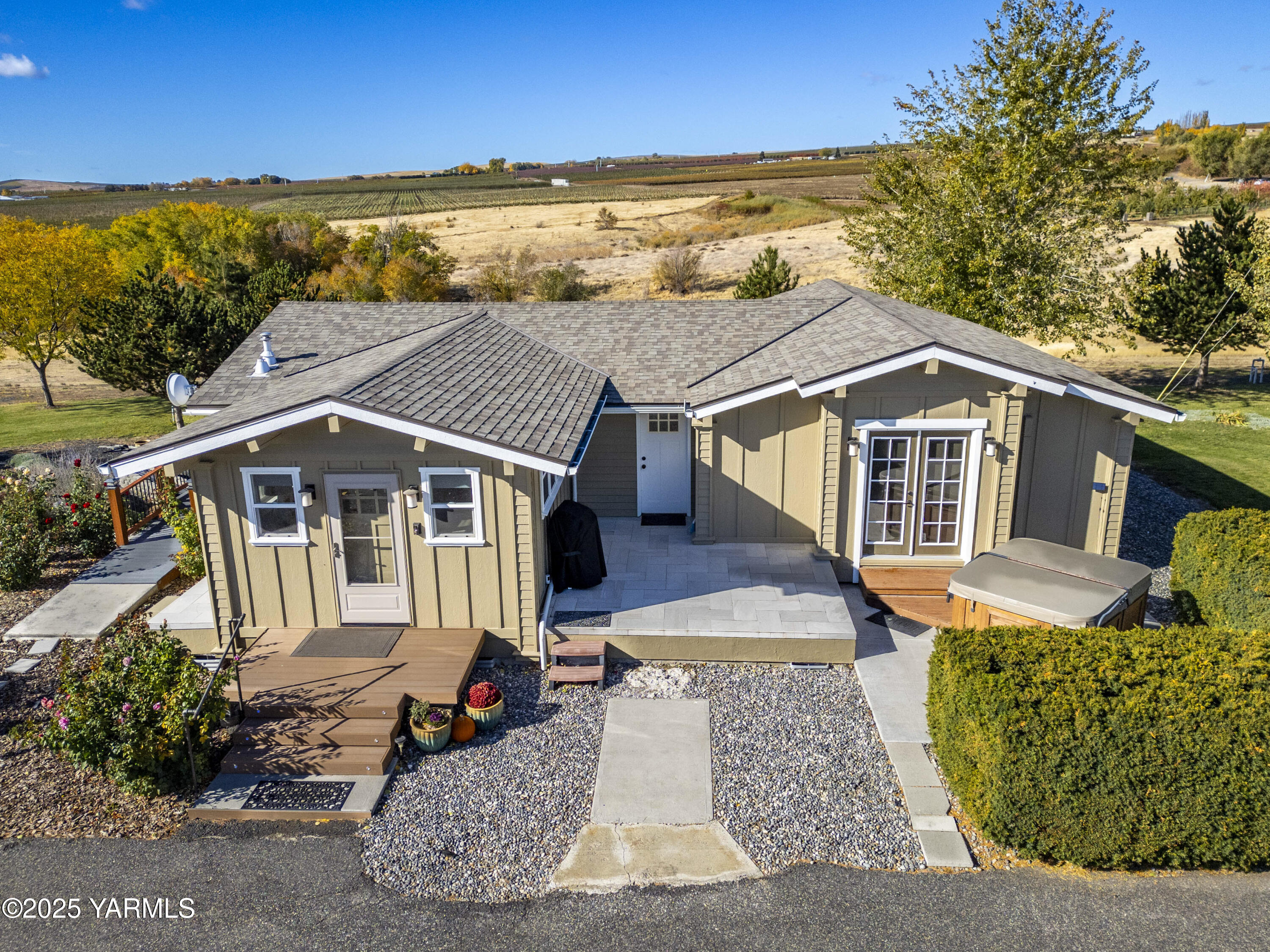 22207 West Gerrick Road Benton City, WA 99320 - Photo 5 of 60 a aerial view of a house with a yard