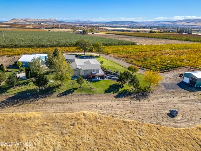 a view of an ocean and a houses