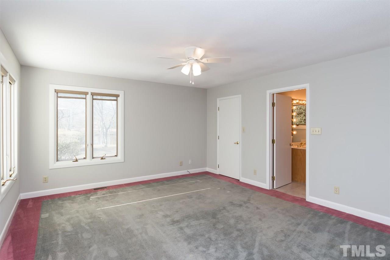 913 Windrow Lane Raleigh, NC 27603 - Photo 17 of 25 an empty room with windows and closet