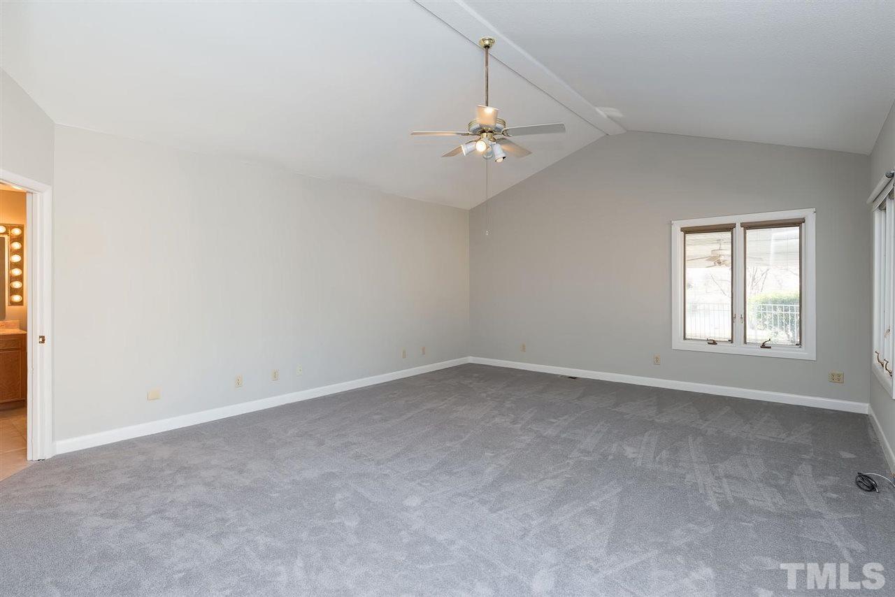 913 Windrow Lane Raleigh, NC 27603 - Photo 22 of 25 an empty room with a window