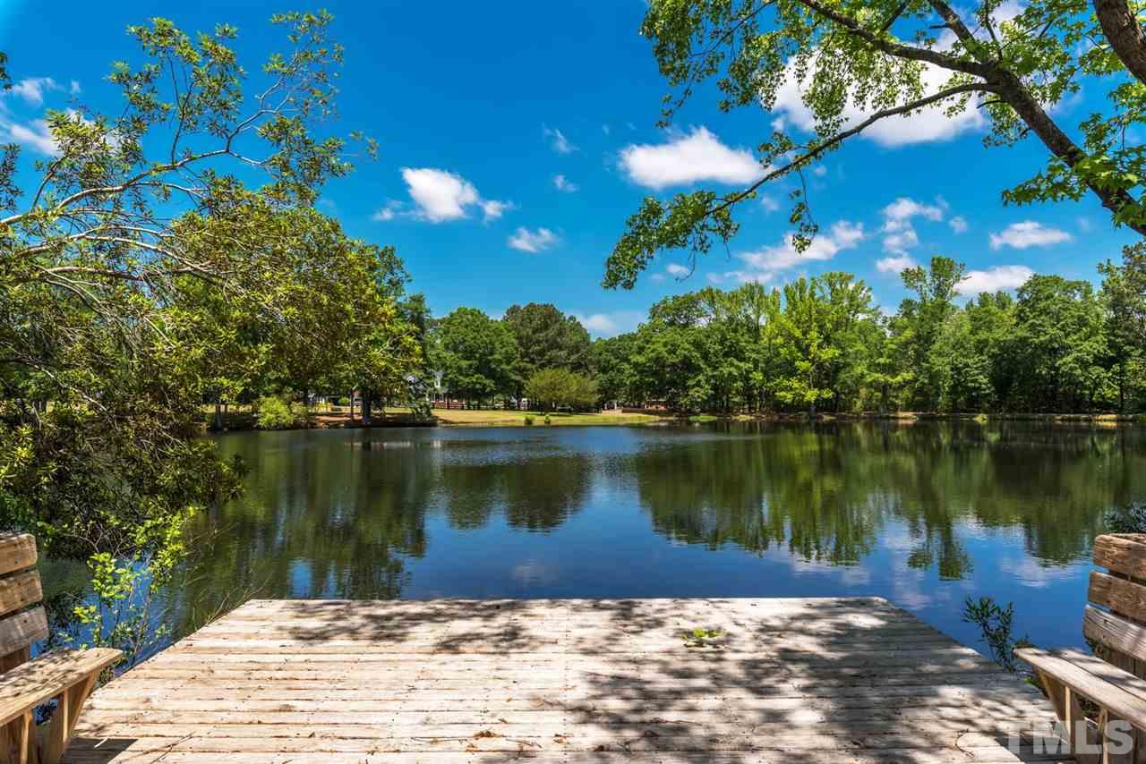 913 Windrow Lane Raleigh, NC 27603 - Photo 7 of 25 a lake view with a lake