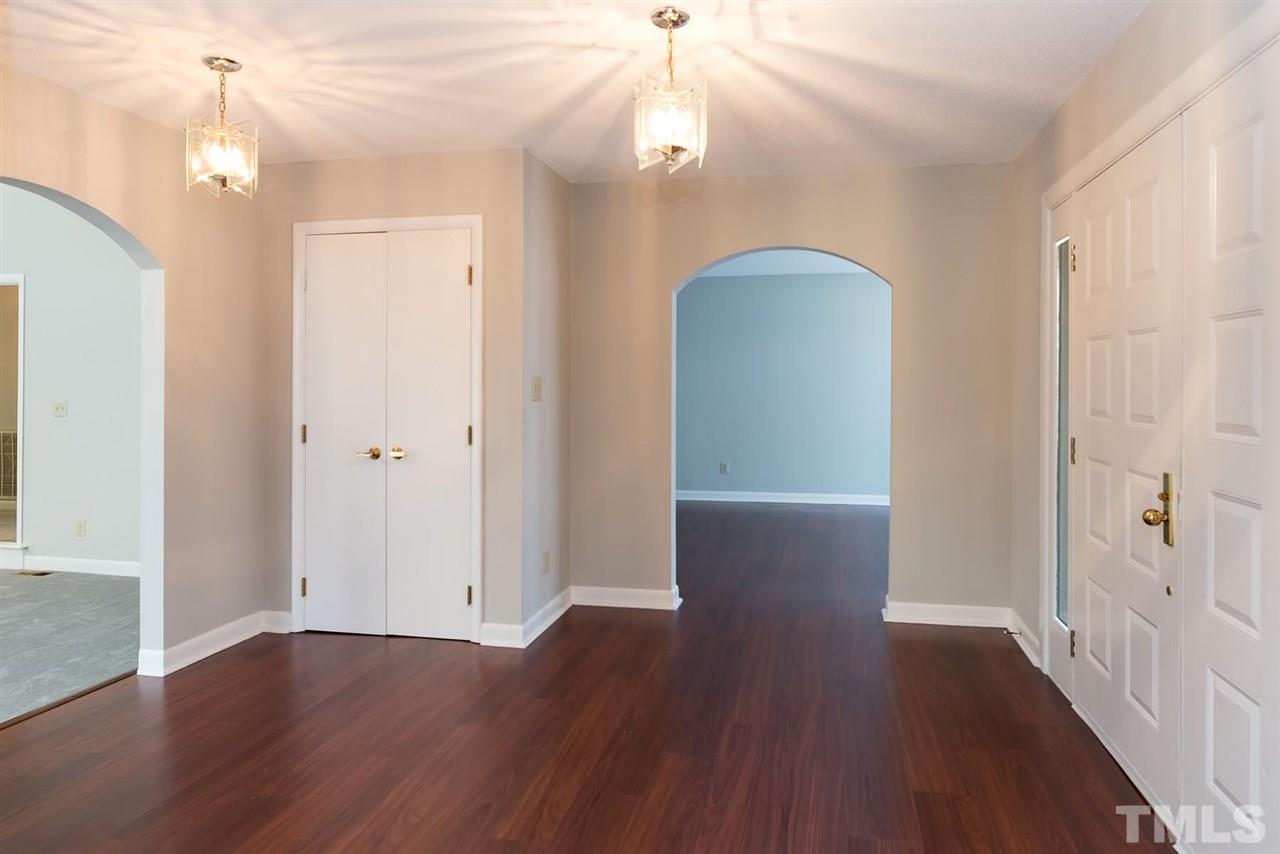 913 Windrow Lane Raleigh, NC 27603 - Photo 10 of 25 a view of livingroom with hardwood floor and hallway