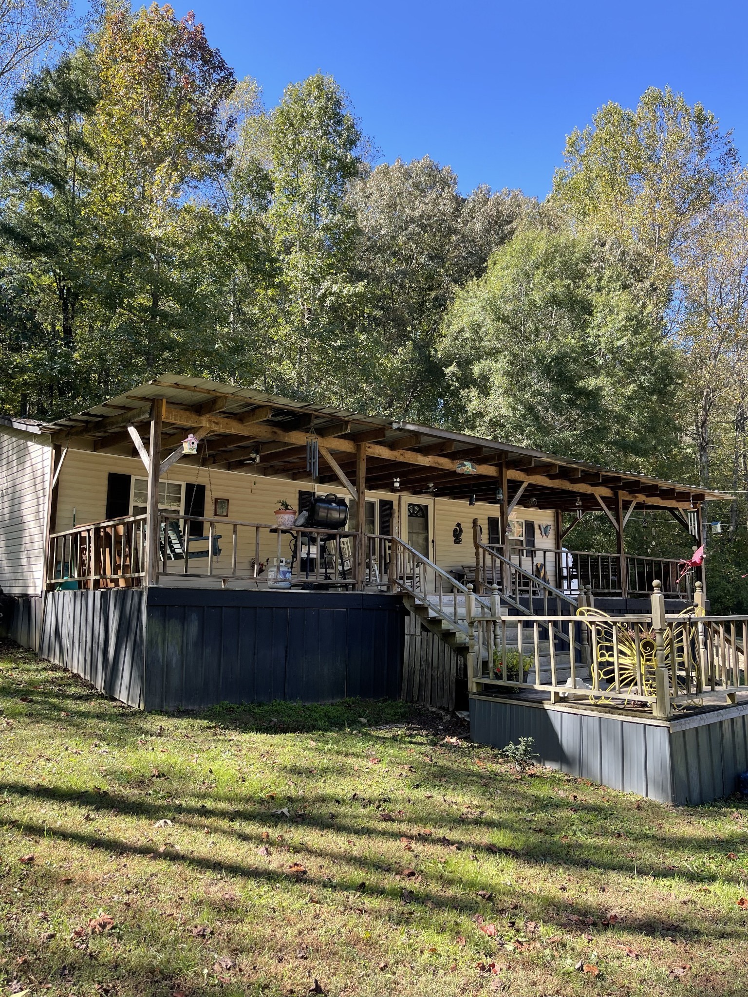 3221 Normandy Road Normandy, TN 37360 - Photo 1 of 36 a view of a house with backyard and deck