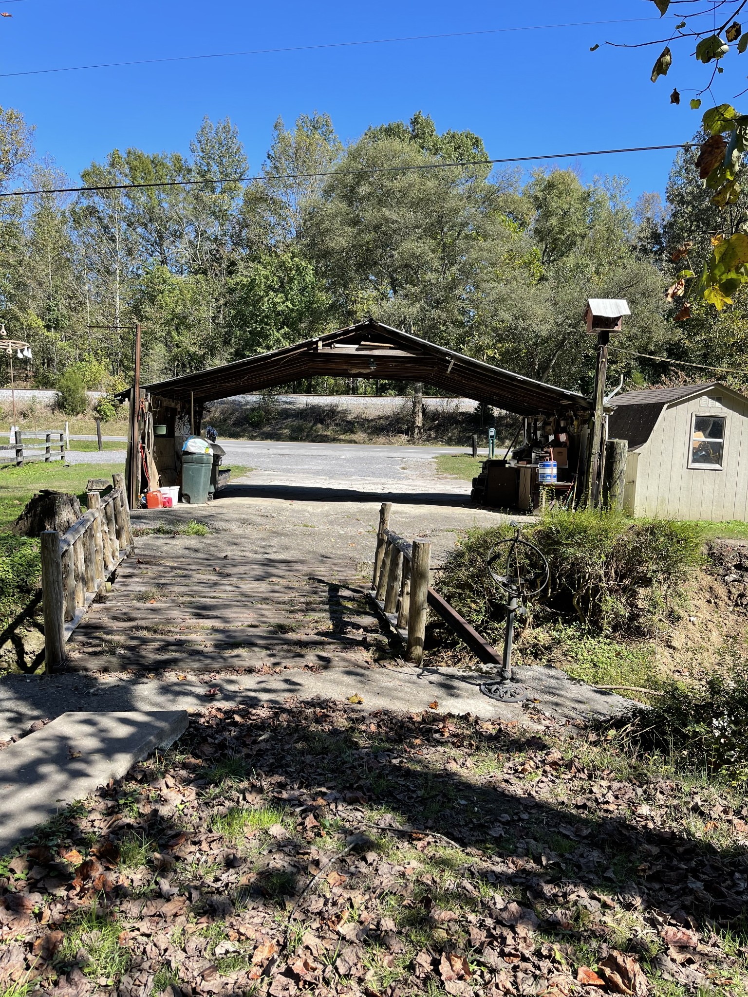 3221 Normandy Road Normandy, TN 37360 - Photo 16 of 36 a view of parked car with wooden fence